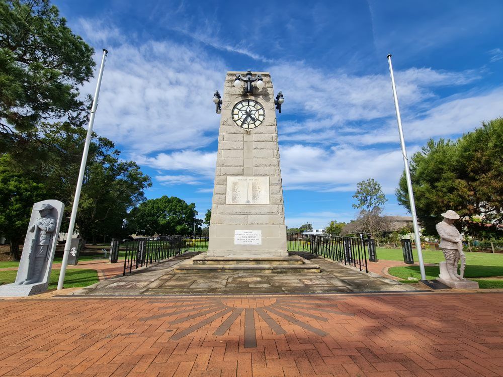 A Clock Tower With A Clock On Top Of It In A Park — The Guttering Cleaning Man in Taree, NSW