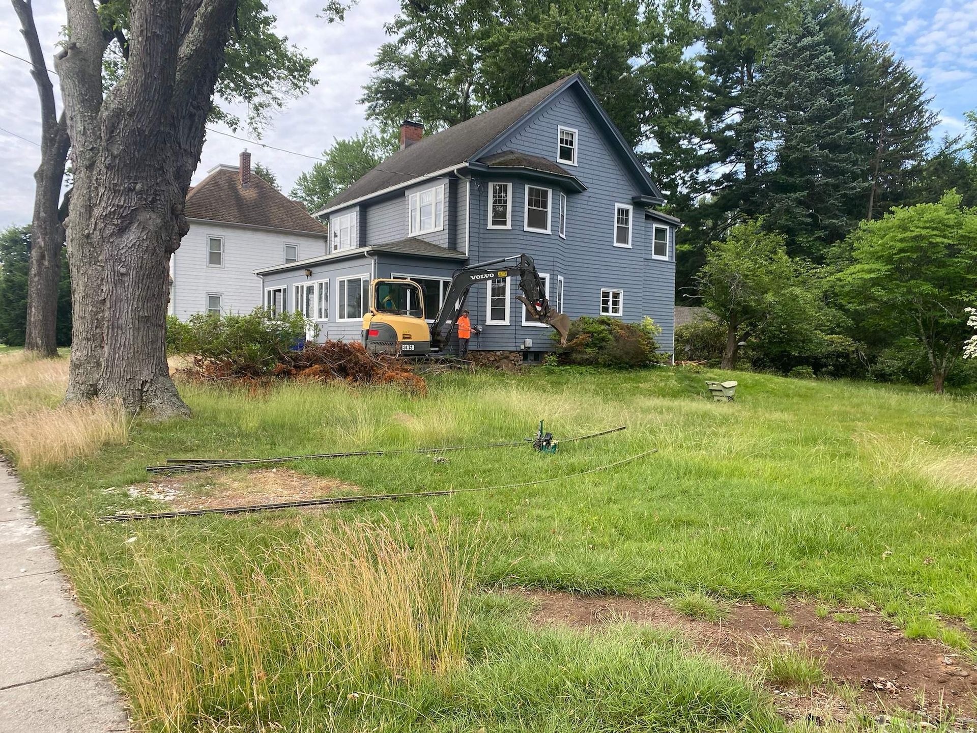 Side house view of 19 Pleasant street in west hartford roof repair.