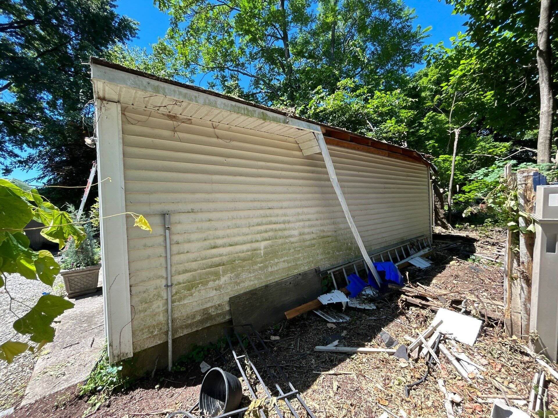 Damage from Fallen Tree hitting garage in hartford west end