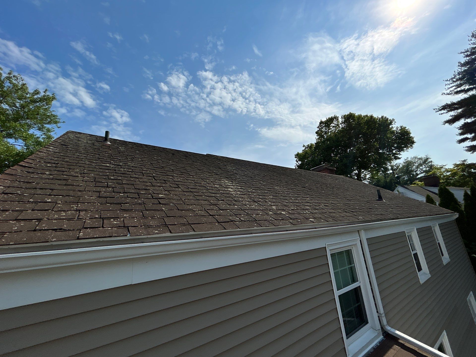 older asphalt shingle roof ready to be replaced in west hartford, ct