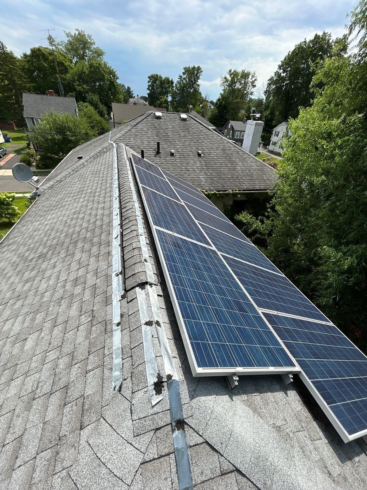 a before photo of an old asphalt roof in bad condition in west hartford, ct