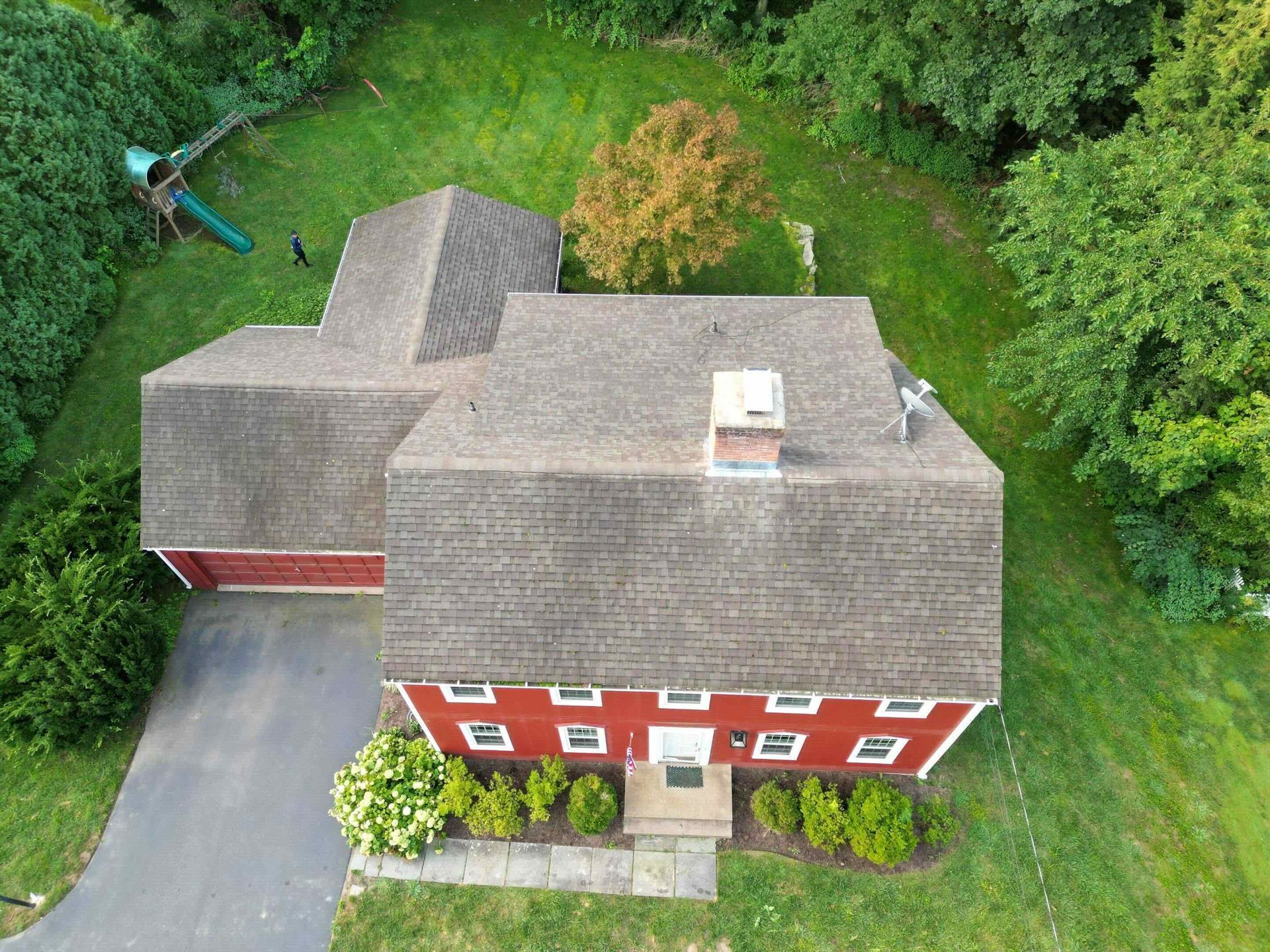 before photo of older roof with lichen, moss, and streaking in need of replacement in west hartford, ct