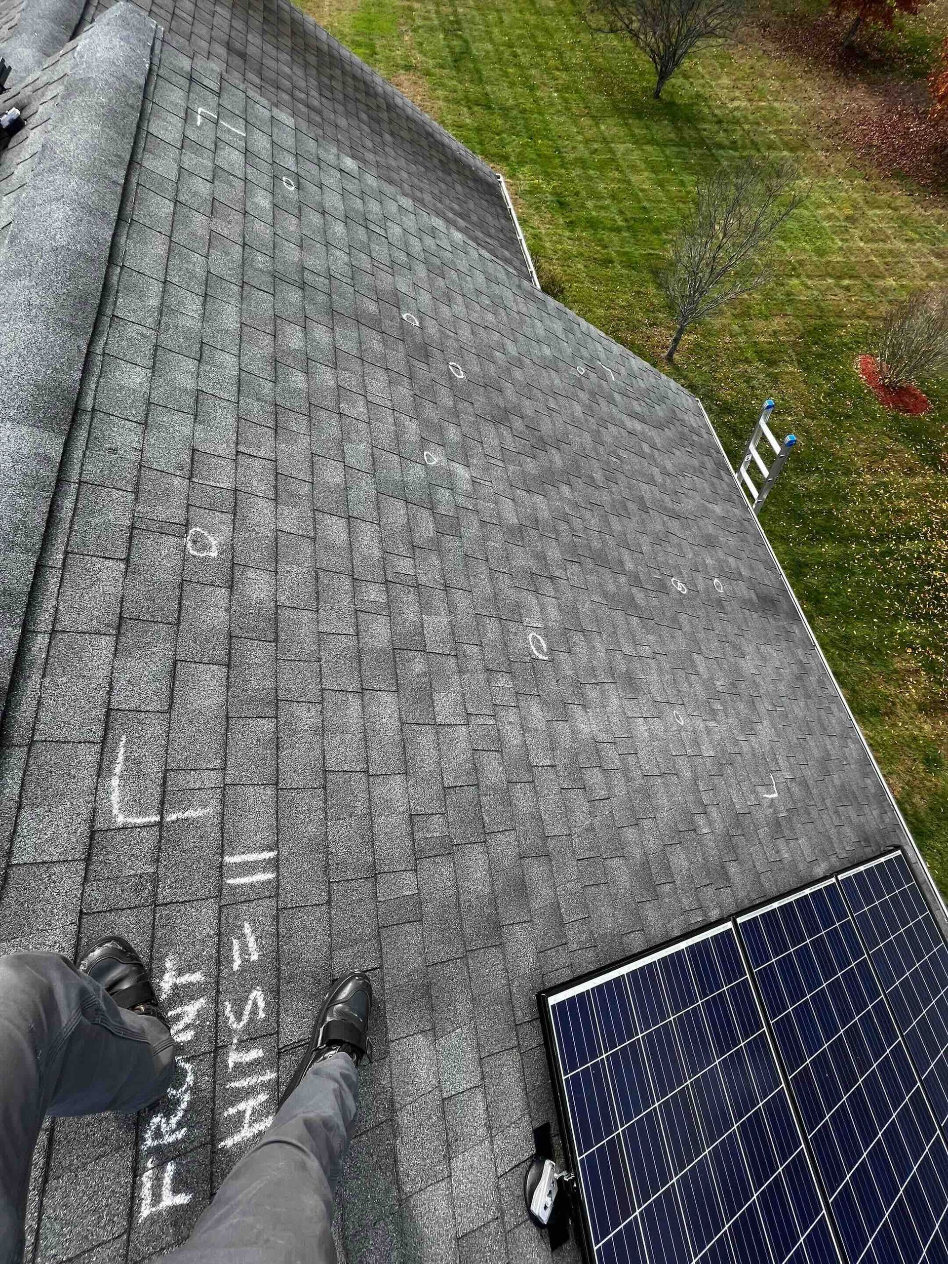 hail storm damaged asphalt roof shingles in east granby, connecticut