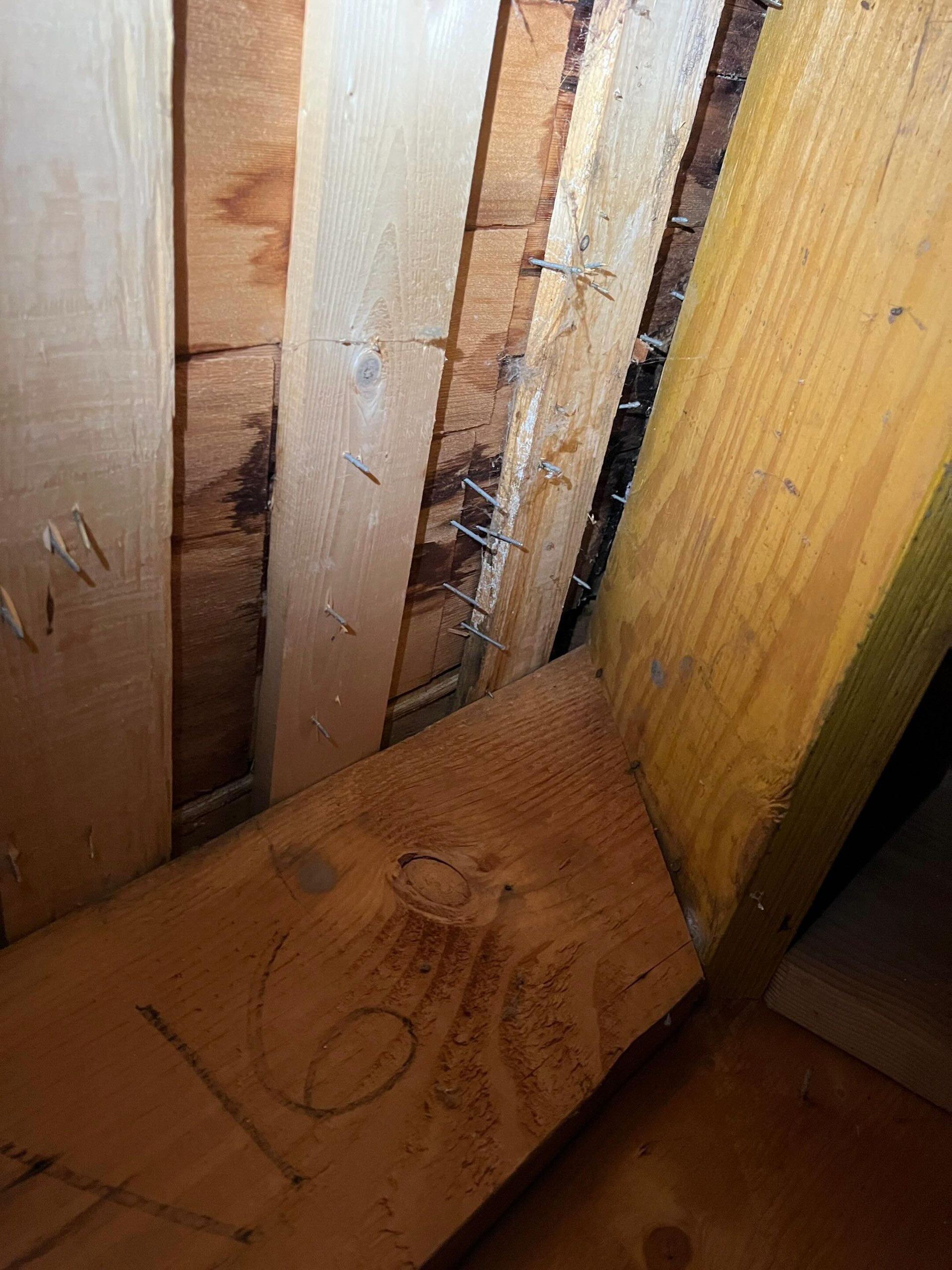 yellow cedar roof installed wrong by the home builder.  Roofing nails are missing the perlins