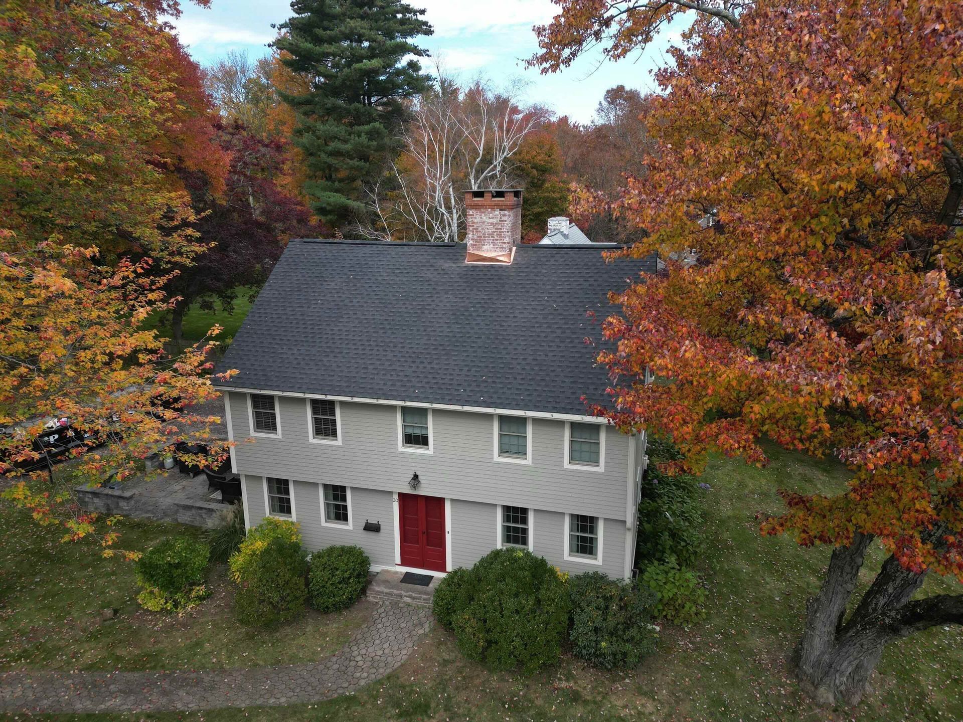 newly installed roof in west hartford with copper chimney flashing