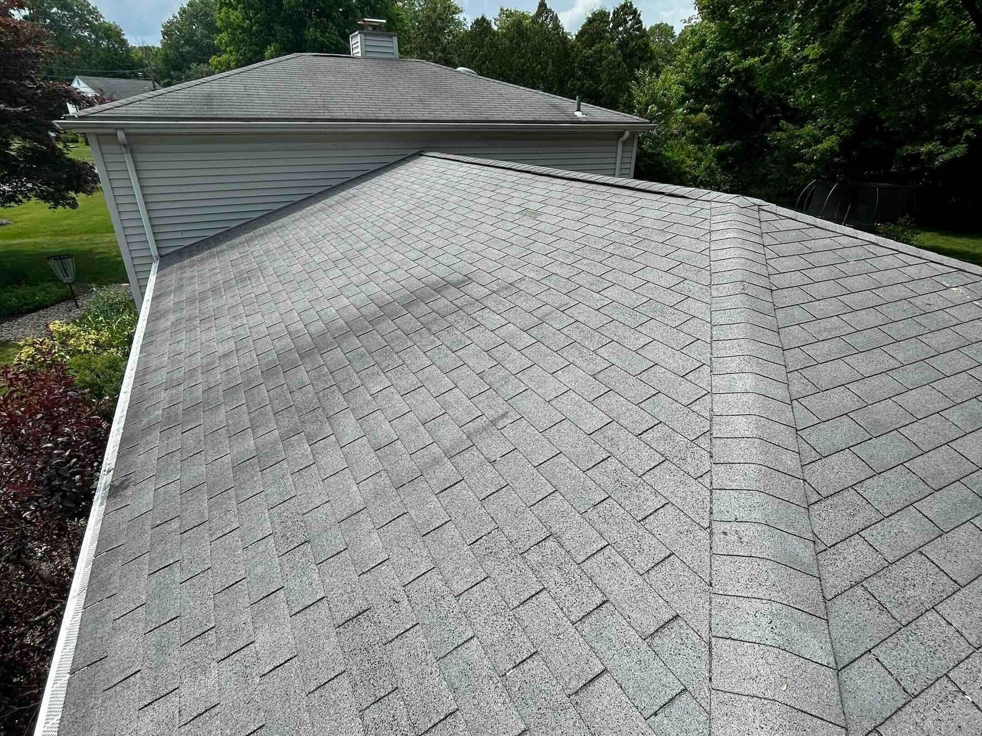 before photo of old three tab roof in farmington, ct with wind damaged shingles