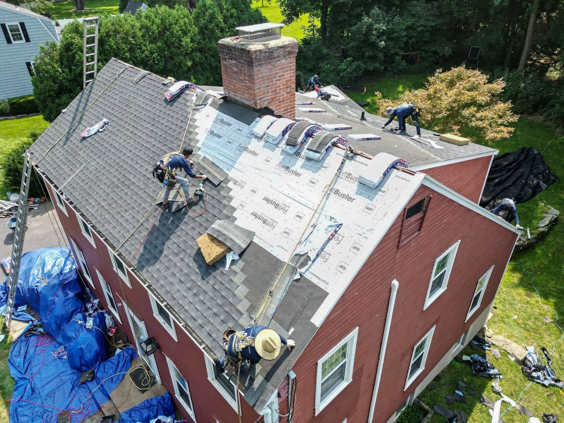 Connecticut Roofing Solutions Crew Installing GAF Timberline HDZ Roof in Glastonbury