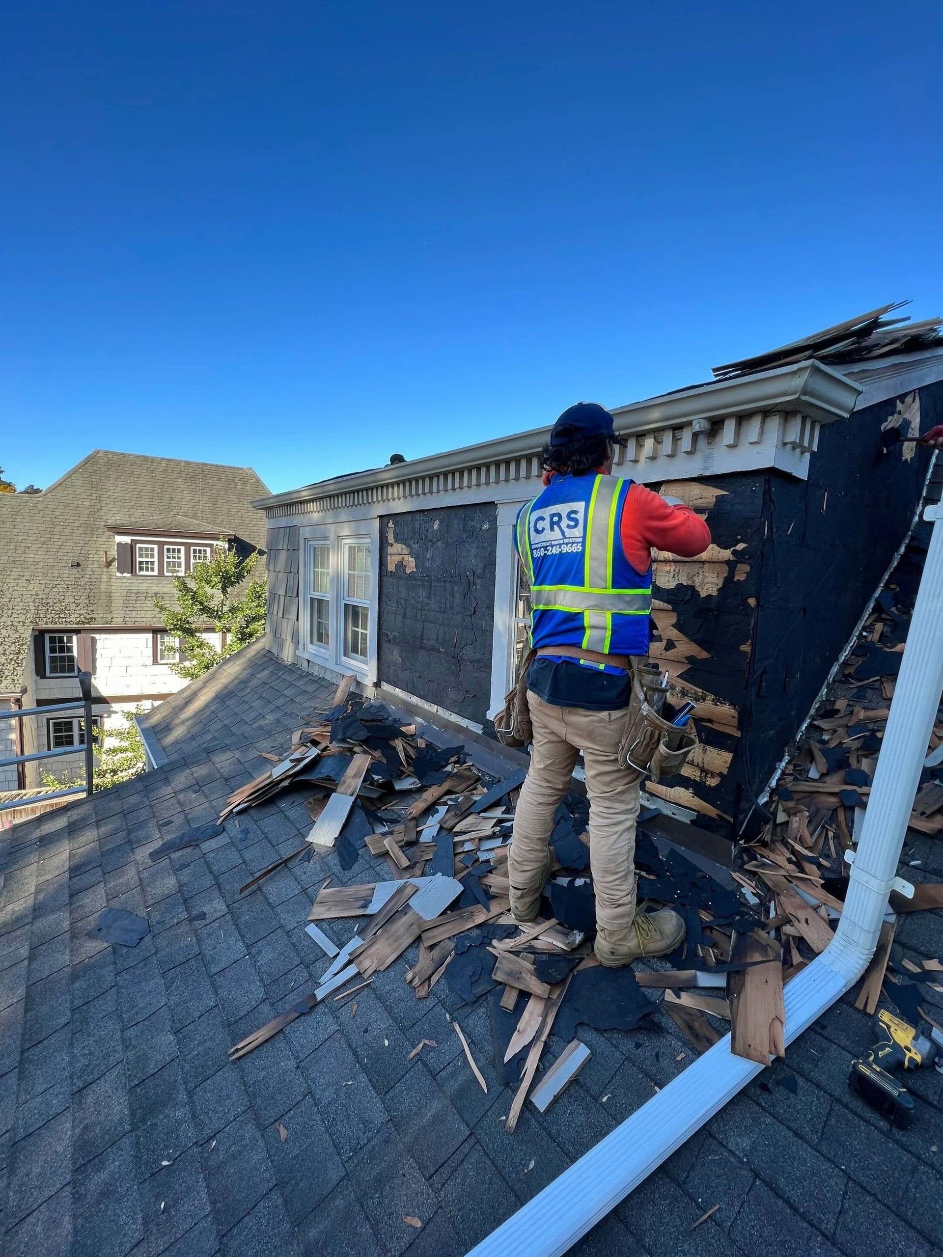 removing old rotting cedar shake siding off residential home in west hartford, ct