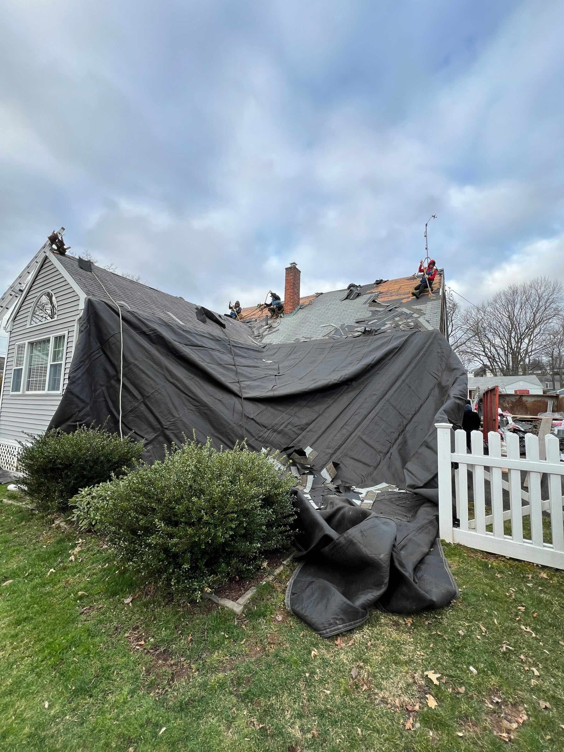 commercial grade tarp during roof removal job in west hartford, ct