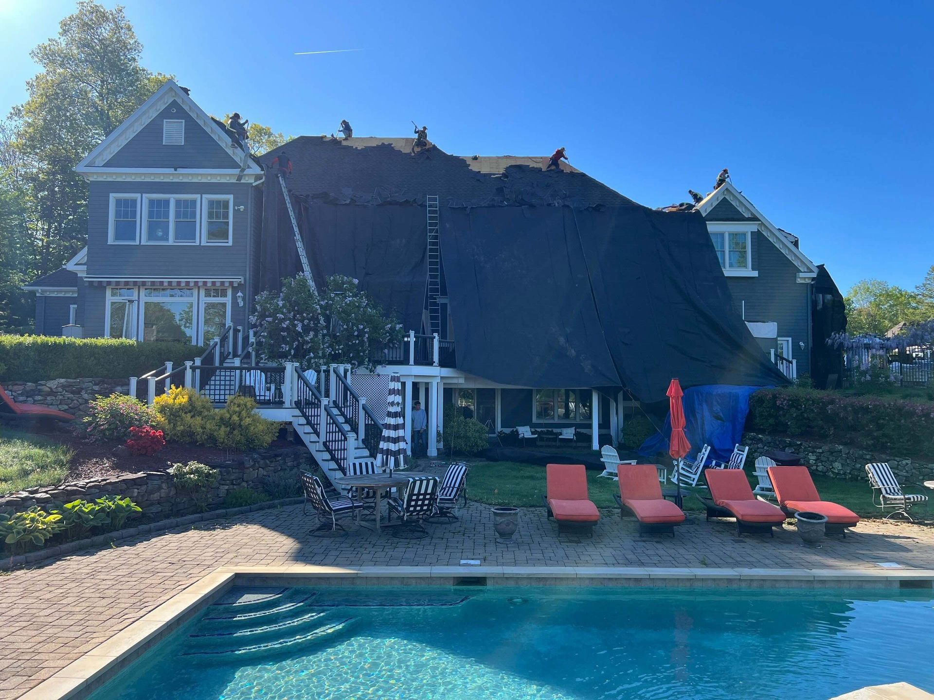 Connecticut Roofing Solutions using Commercial Grade Tarps to Protect Property During Demolition