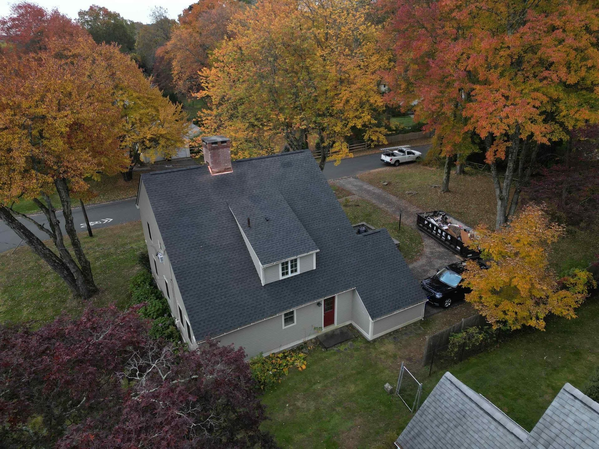 drone photo of new roof in west hartford, ct with copper chimney flashing