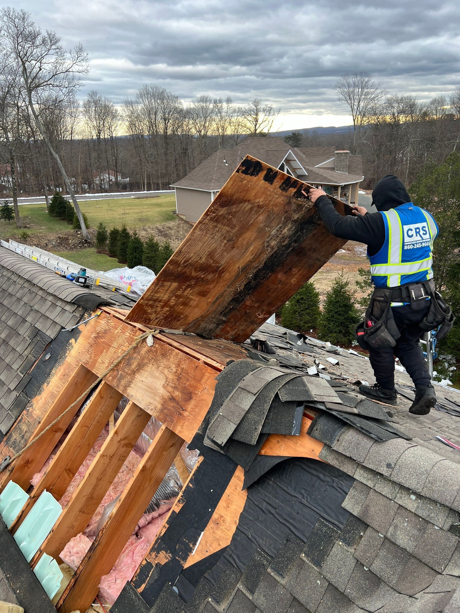 Connecticut Roofing Solutions removing rotted plywood decking off Residential Roof