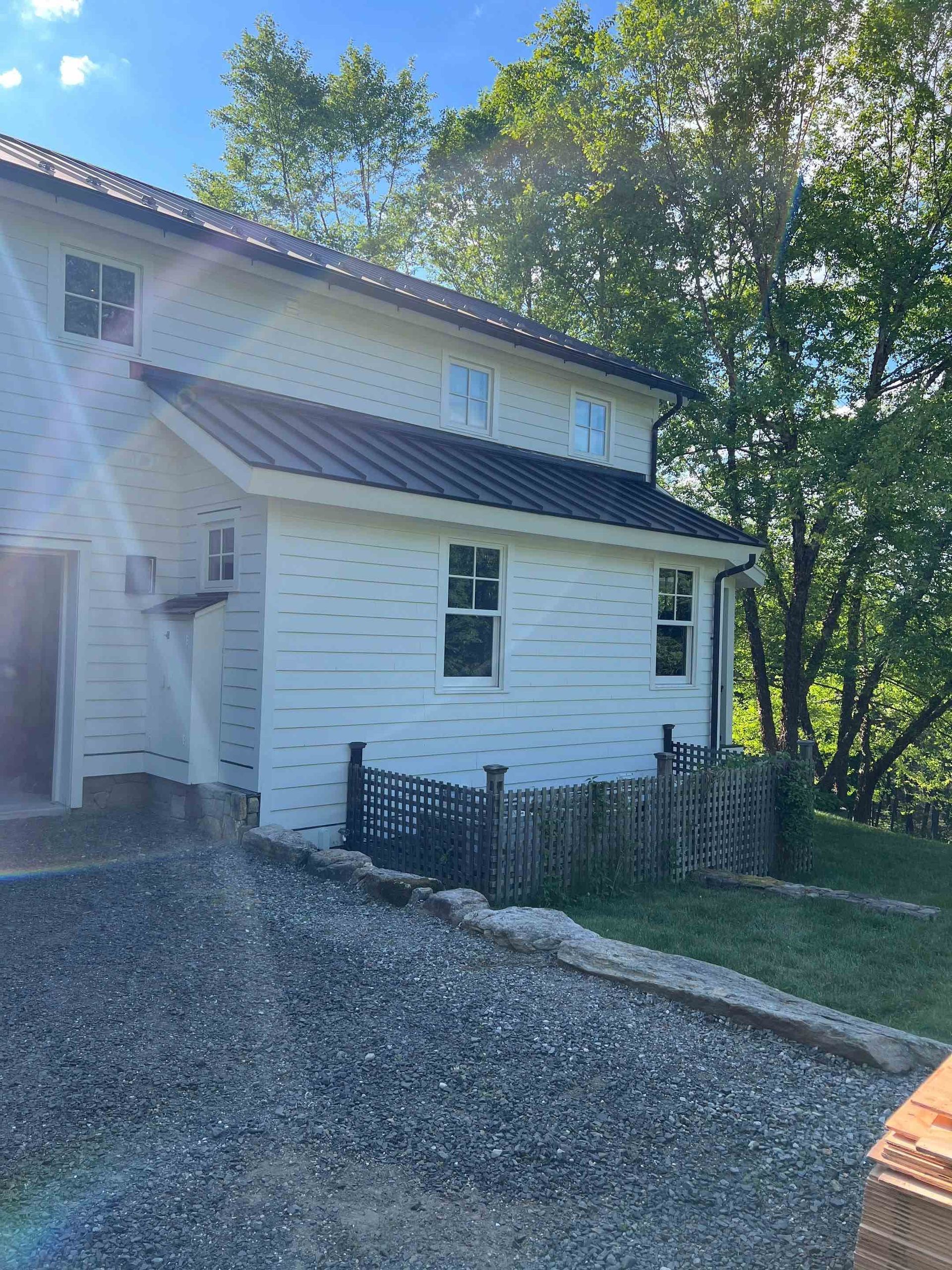 commercial roof work with new flashing boots on all chimneys extra ice and water protection in Torrington, Connecticut