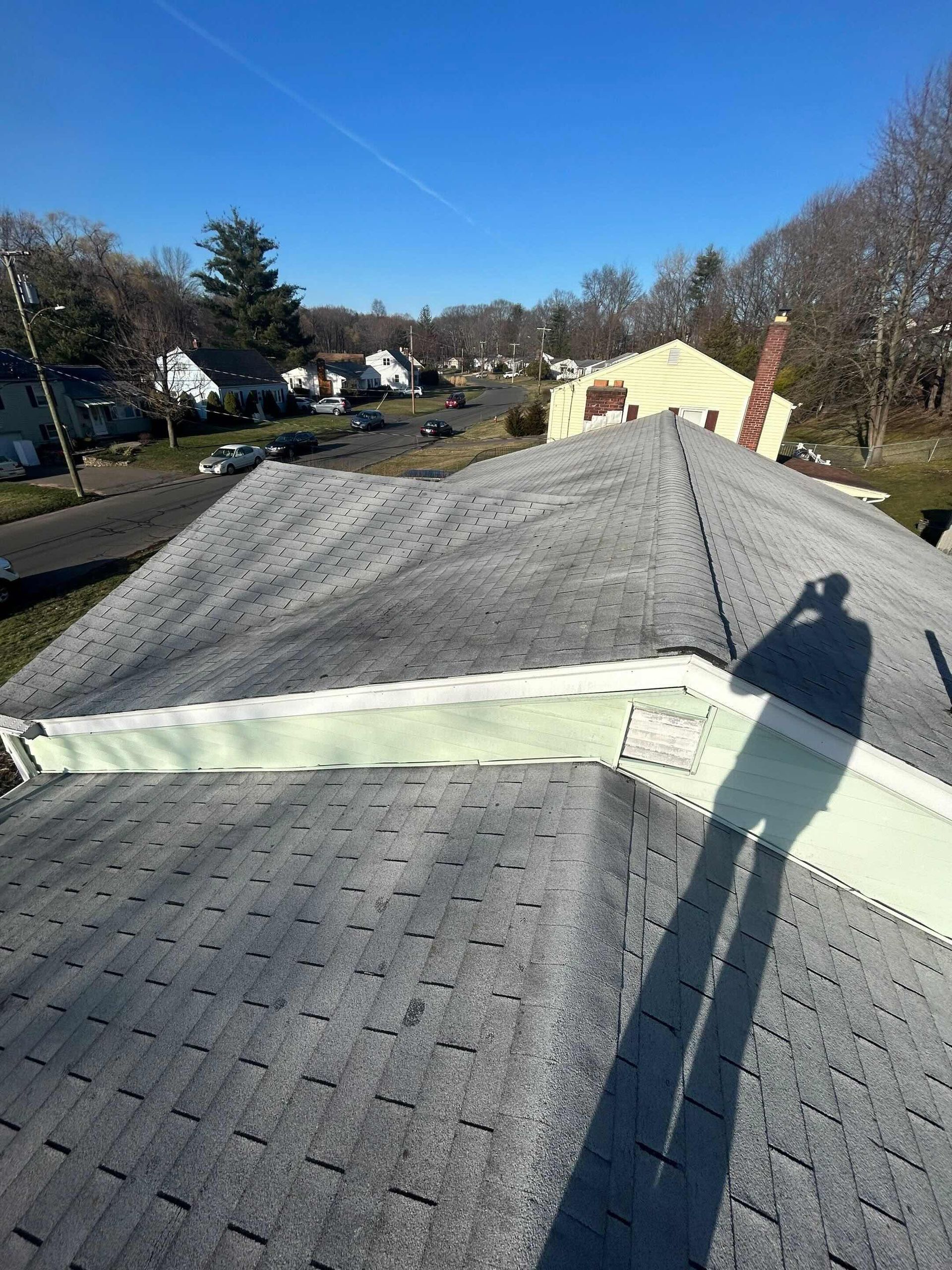 three tab asphalt roof shingles with wind storm damage in new britain, ct