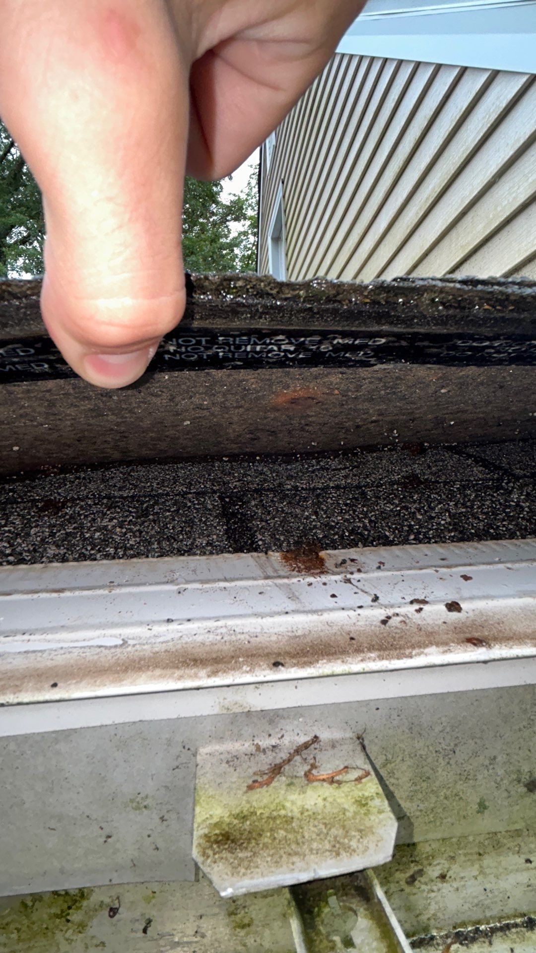 two layers of asphalt roofing shingles found during inspection