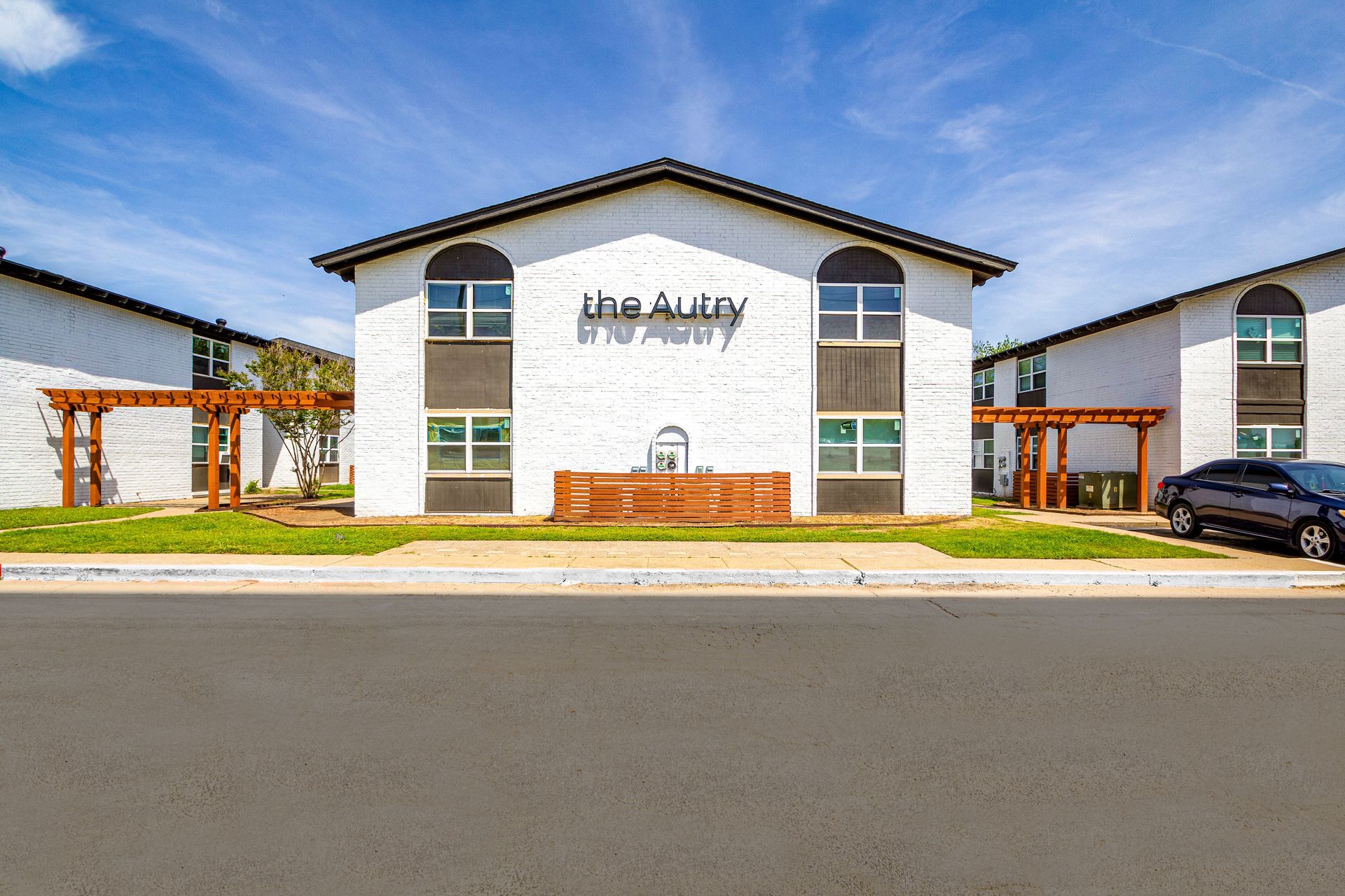 White brick apartment building with