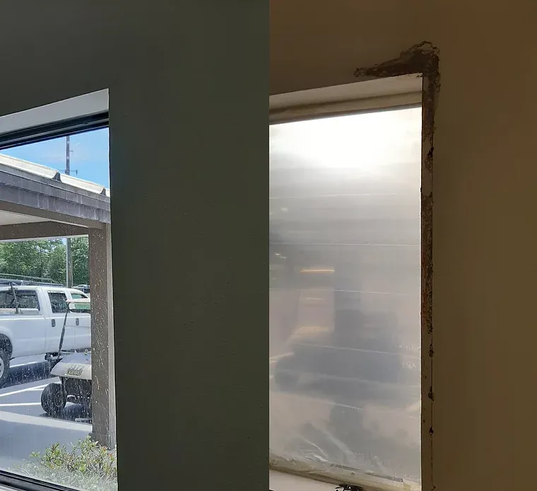 Two window views: one showing a bright exterior with a truck; the other interior, with plastic covering a window frame.