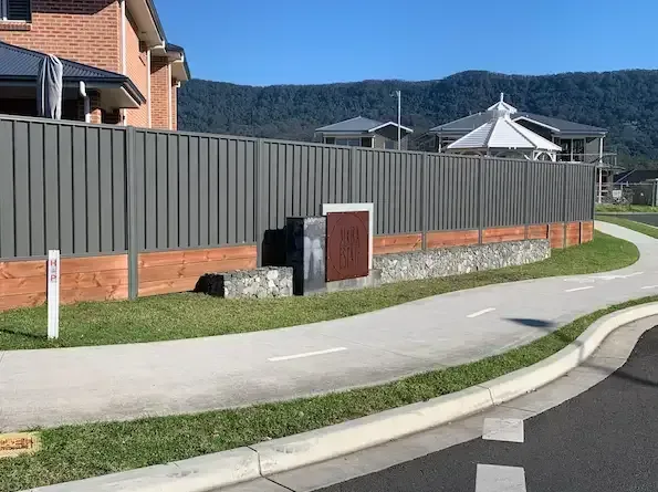 There Is A Fence Along The Side Of The Road — Perry's Timber & Fencing In Dapto, NSW