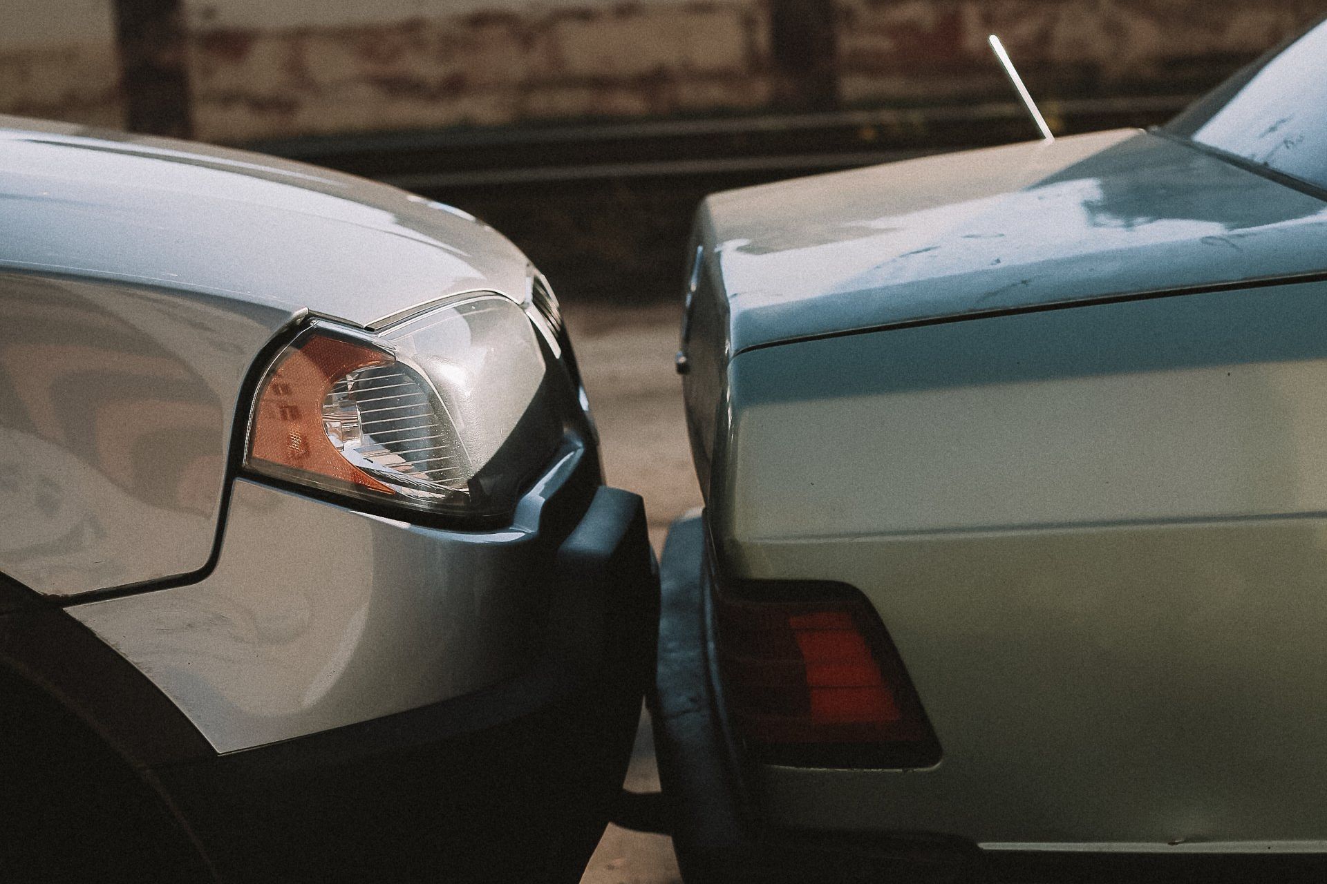 Photo of two car bumpers collided