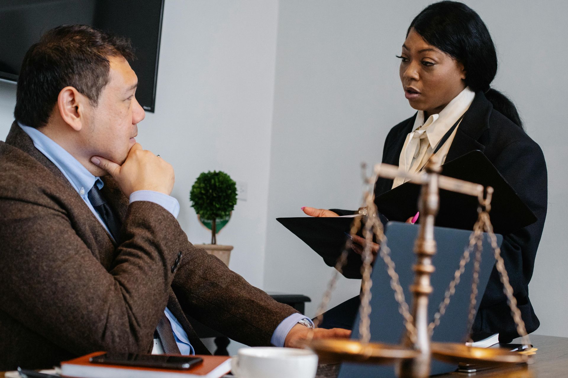 Photo of two accident attorneys in Gwinnett talking to each other