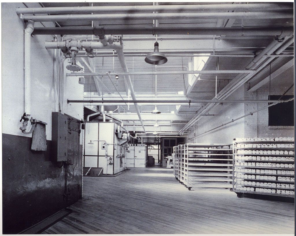 A black and white photo of an empty warehouse
