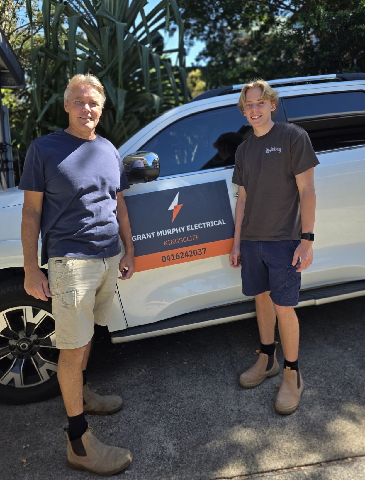 Pilates studio: Reformer, white couch, wood floor, teal door, natural light. — Grant Murphy Electrical in Kingscliff, NSW