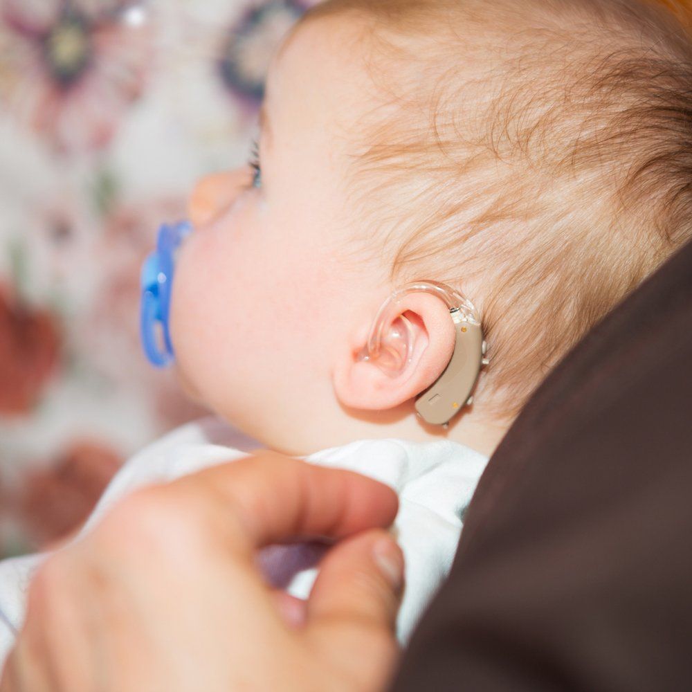Baby Wearing A Hearing Aid — Hilo, HI — Hearing Solutions Hawaii