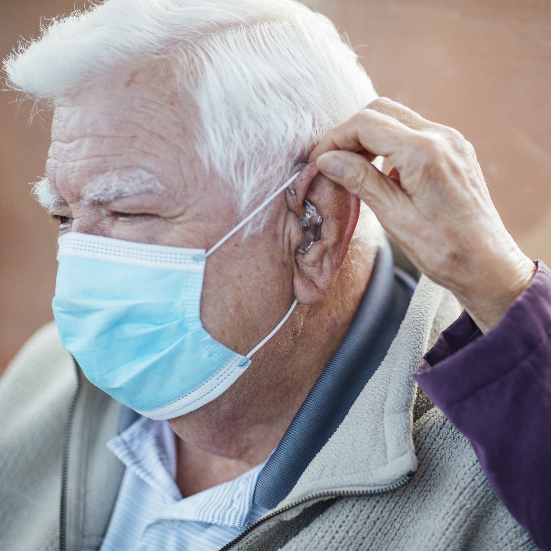 Old Man Wearing A Hearing Aid — Hilo, HI — Hearing Solutions Hawaii