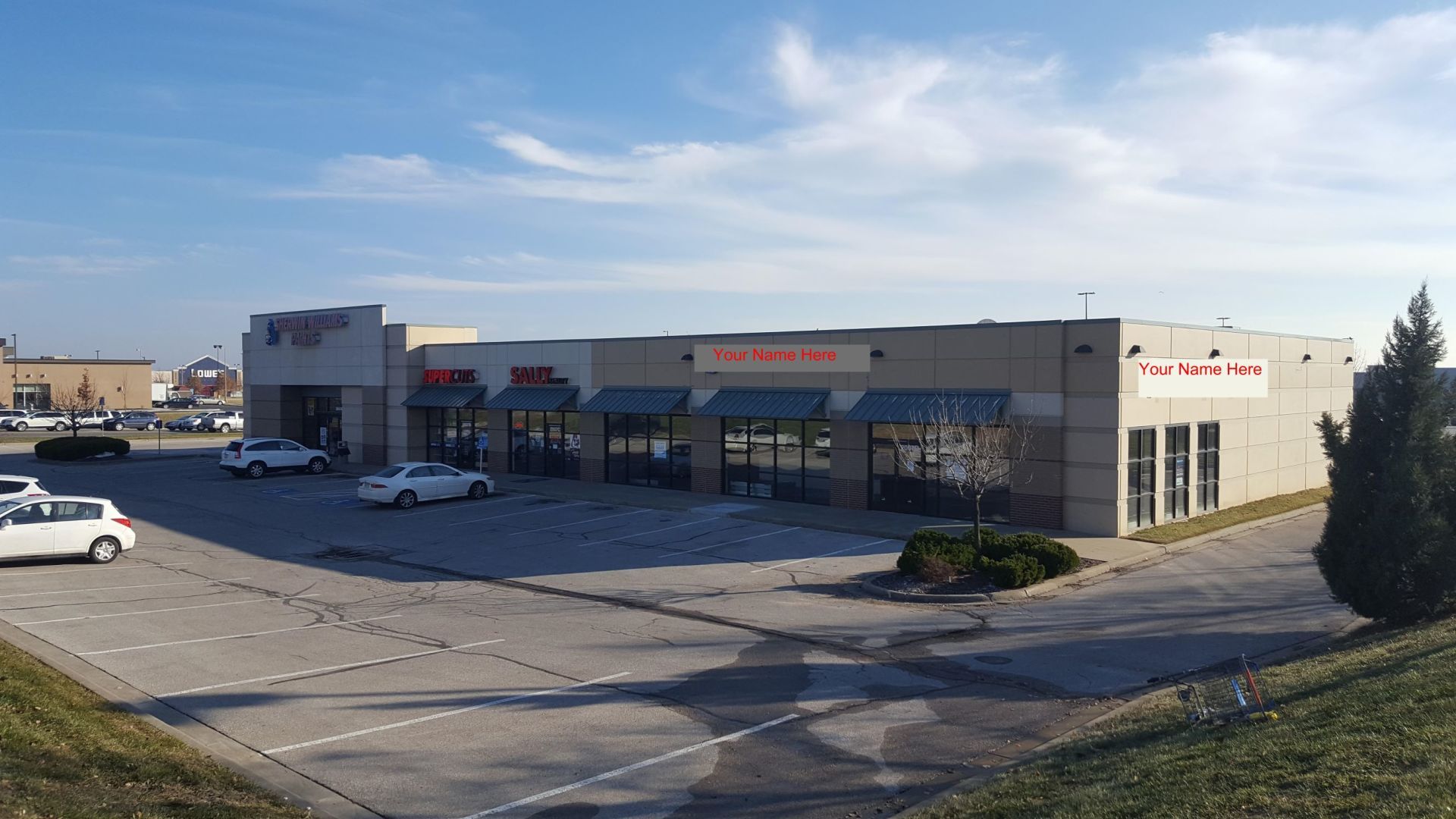A large building with a lot of cars parked in front of it.