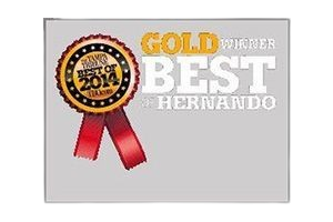 Gold winner "Best of Hernando" award, 2014, with red ribbon on gray background.