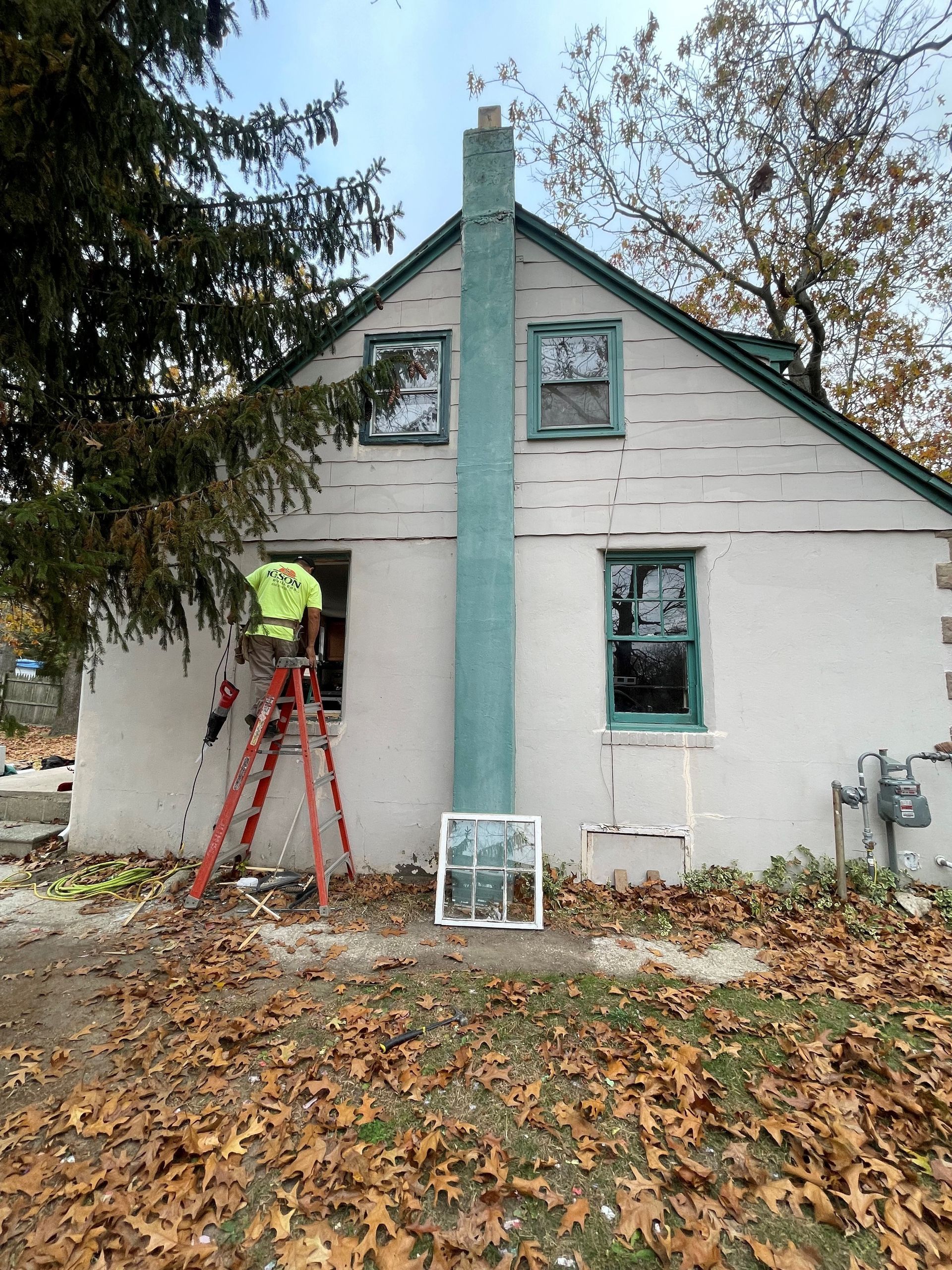 new windows installed in big house with nice back yard