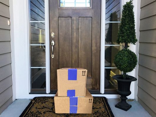Packages by a door photo