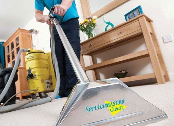 Vacuuming Carpet Floor — Spruce Pine, NC — ServiceMaster of WNC