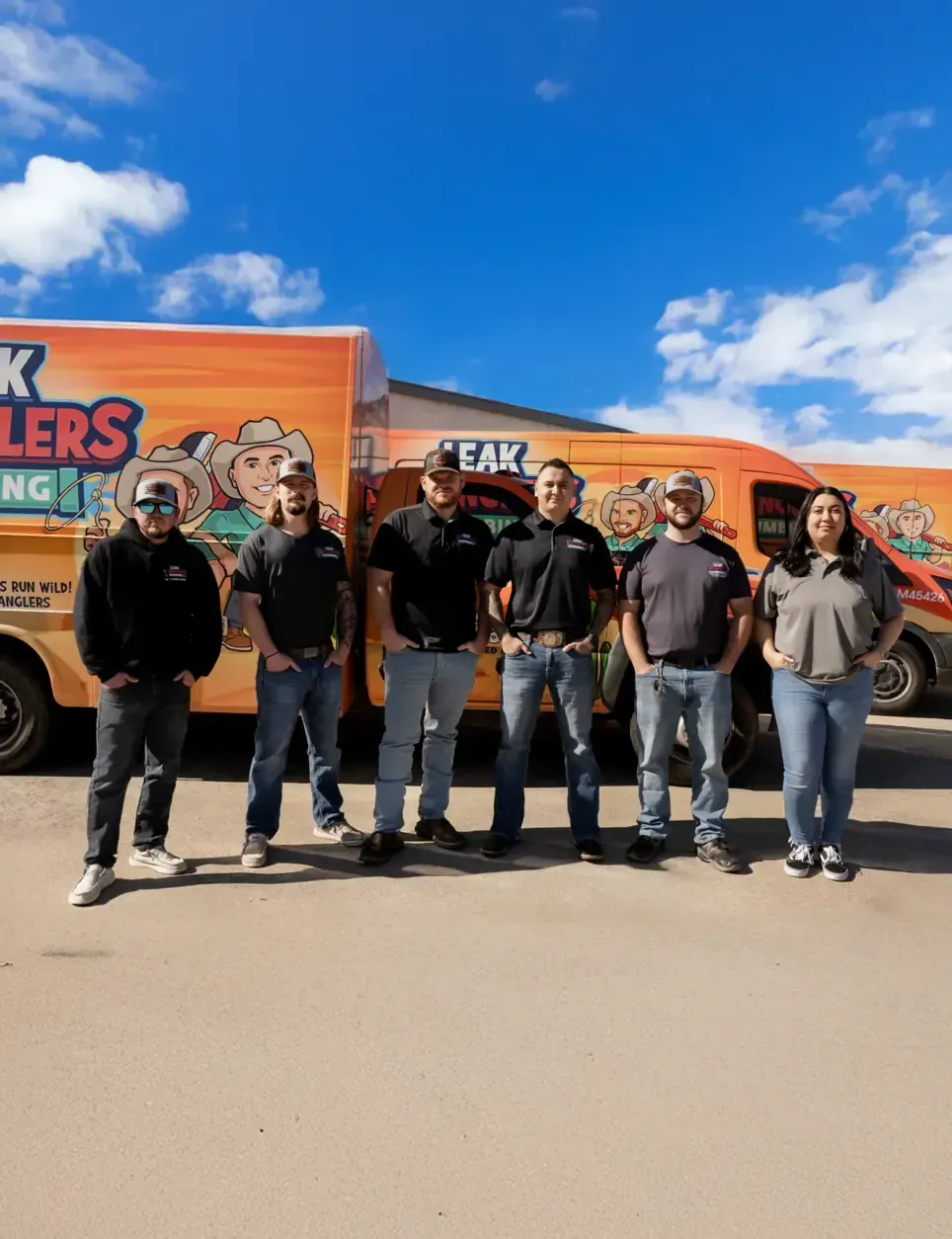 A group of people standing in front of a truck.