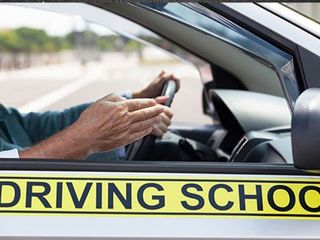 Driving Instructor — Student Driving Car With Instructor in Mine Hill, NJ