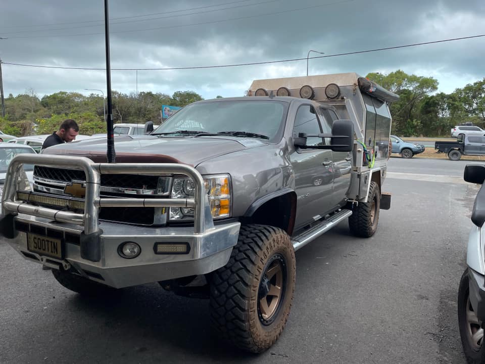 A Gray Truck is Parked in a Parking Lot on a Cloudy Day — Cairns Auto Electrical Mechanical Air & Audio in Stratford, QLD