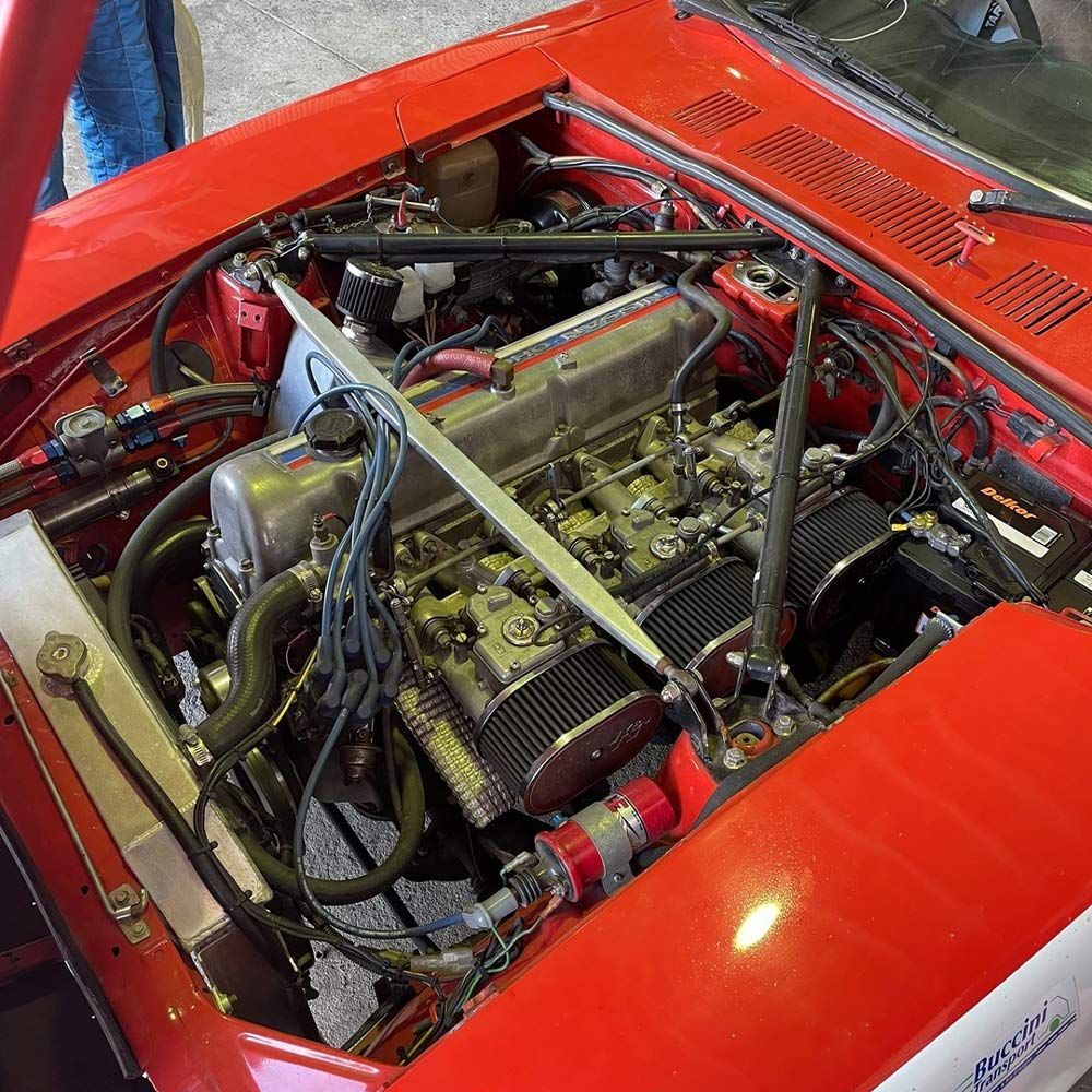 Checking Wiring and Motor of A Vehicle Engine in A Garage