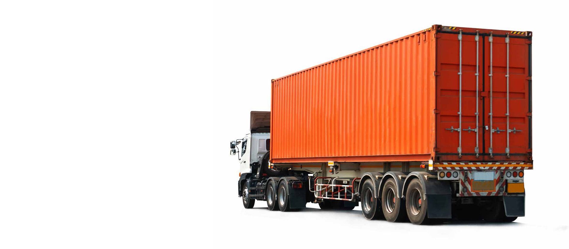 An aerial view of a large container ship floating on top of a body of water.