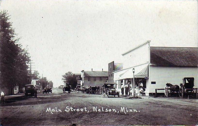 A black and white photo of main street in nelson minnesota