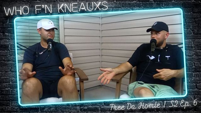 Two men are sitting in chairs in front of a neon sign that says who f n kneauxs