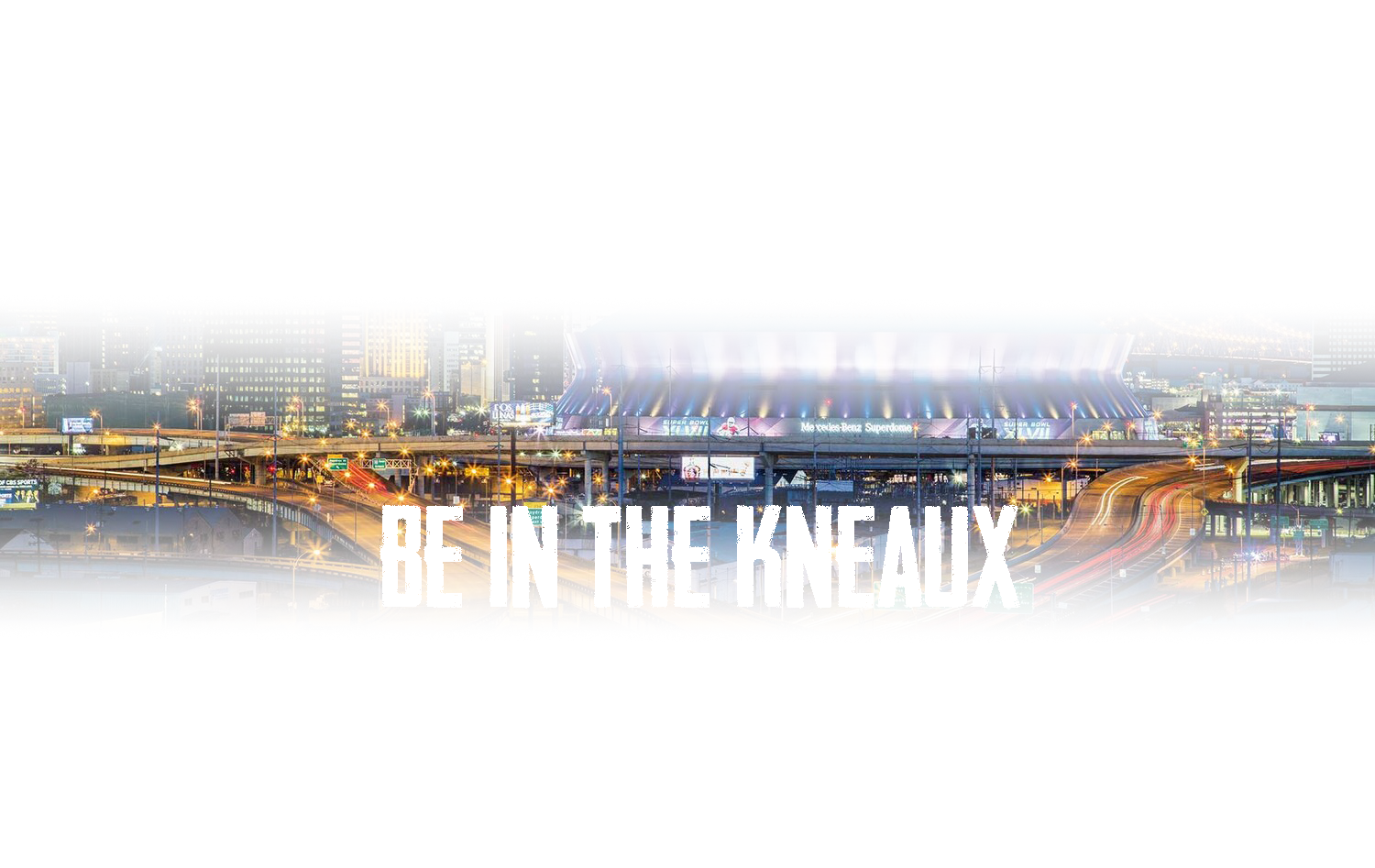 A picture of a city at night with the words `` be in the kneaux '' written on it.