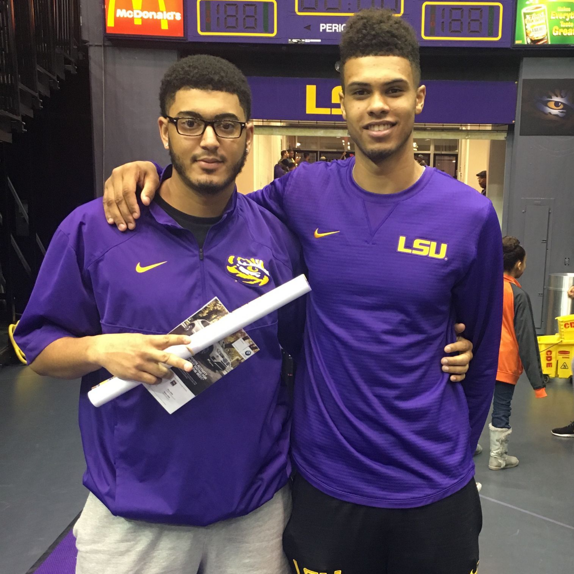 A man with a beard wearing a black hoodie with the word geek on it