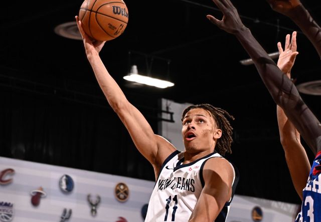 A basketball player with the number 11 on his jersey