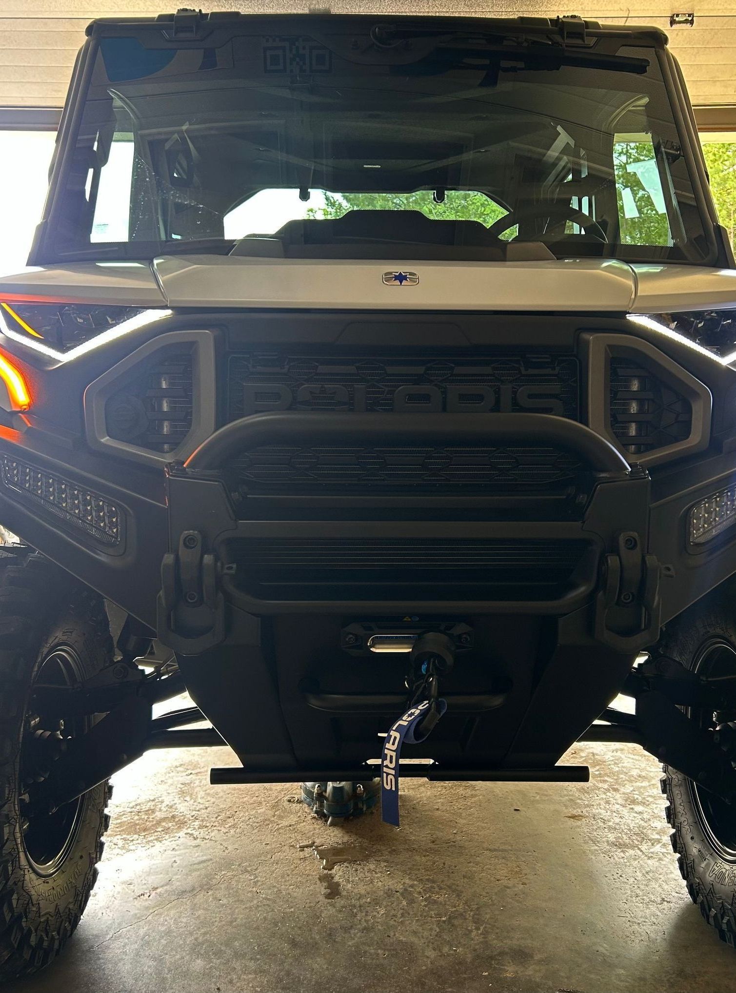 A close up of a headlight on a vehicle