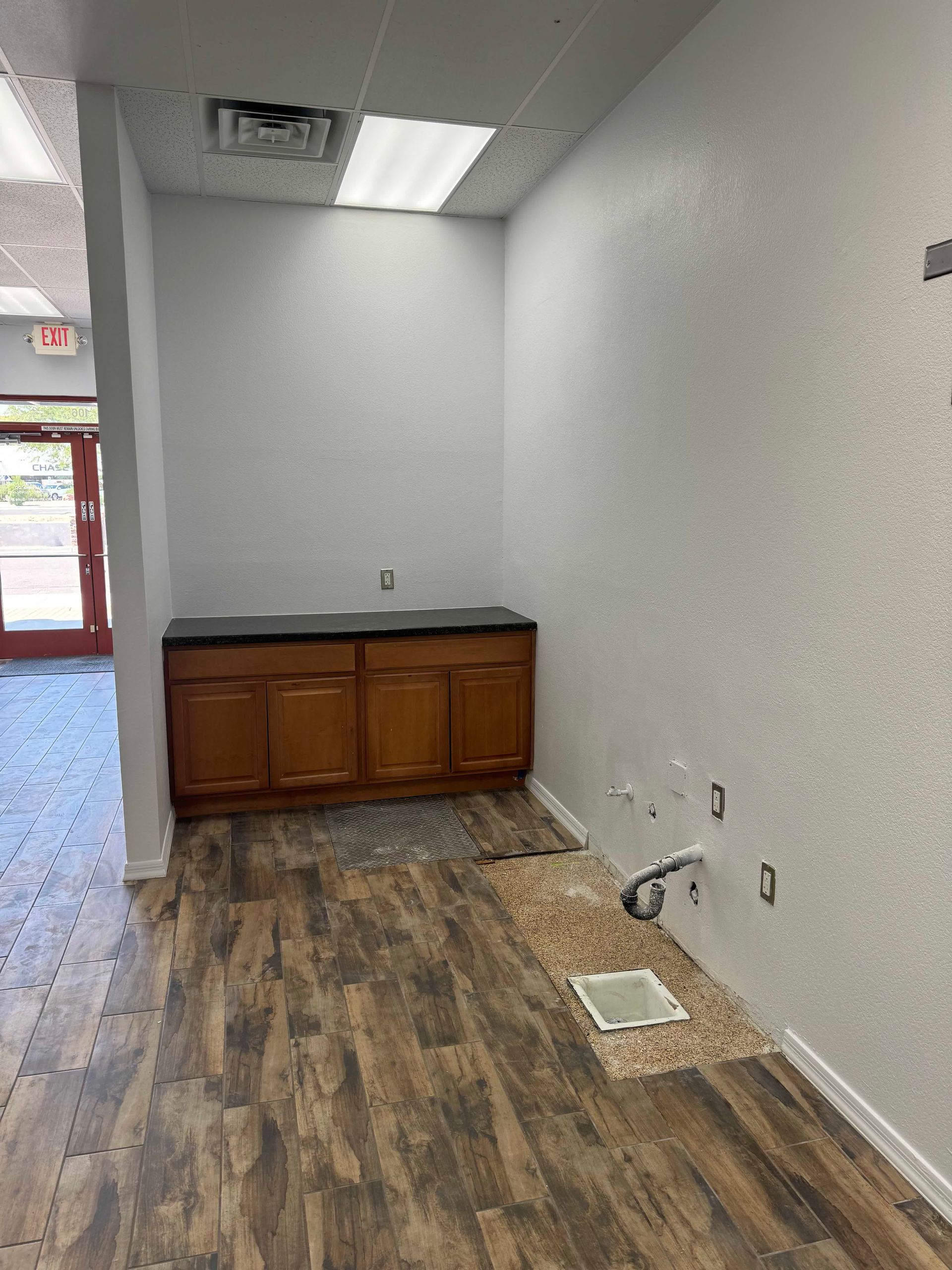 There is a sink in the middle of the room.