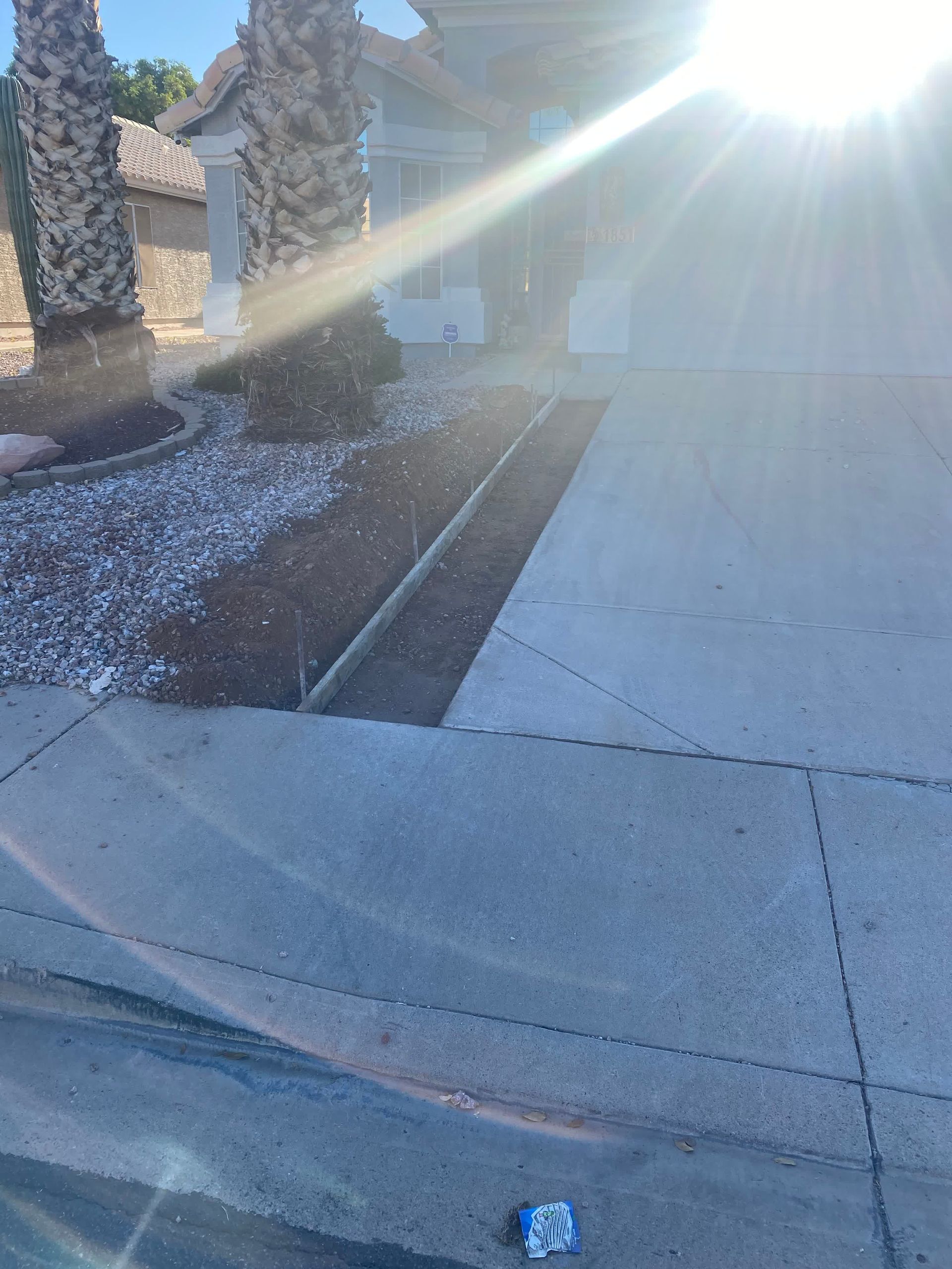 The sun is shining through the window of a car.