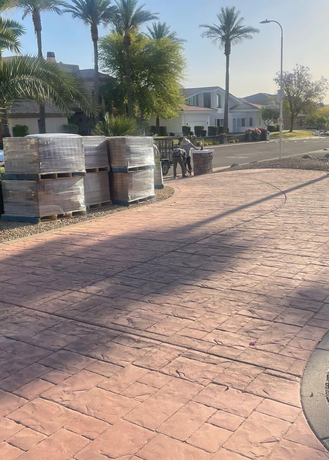 A brick sidewalk with a lot of bricks on it