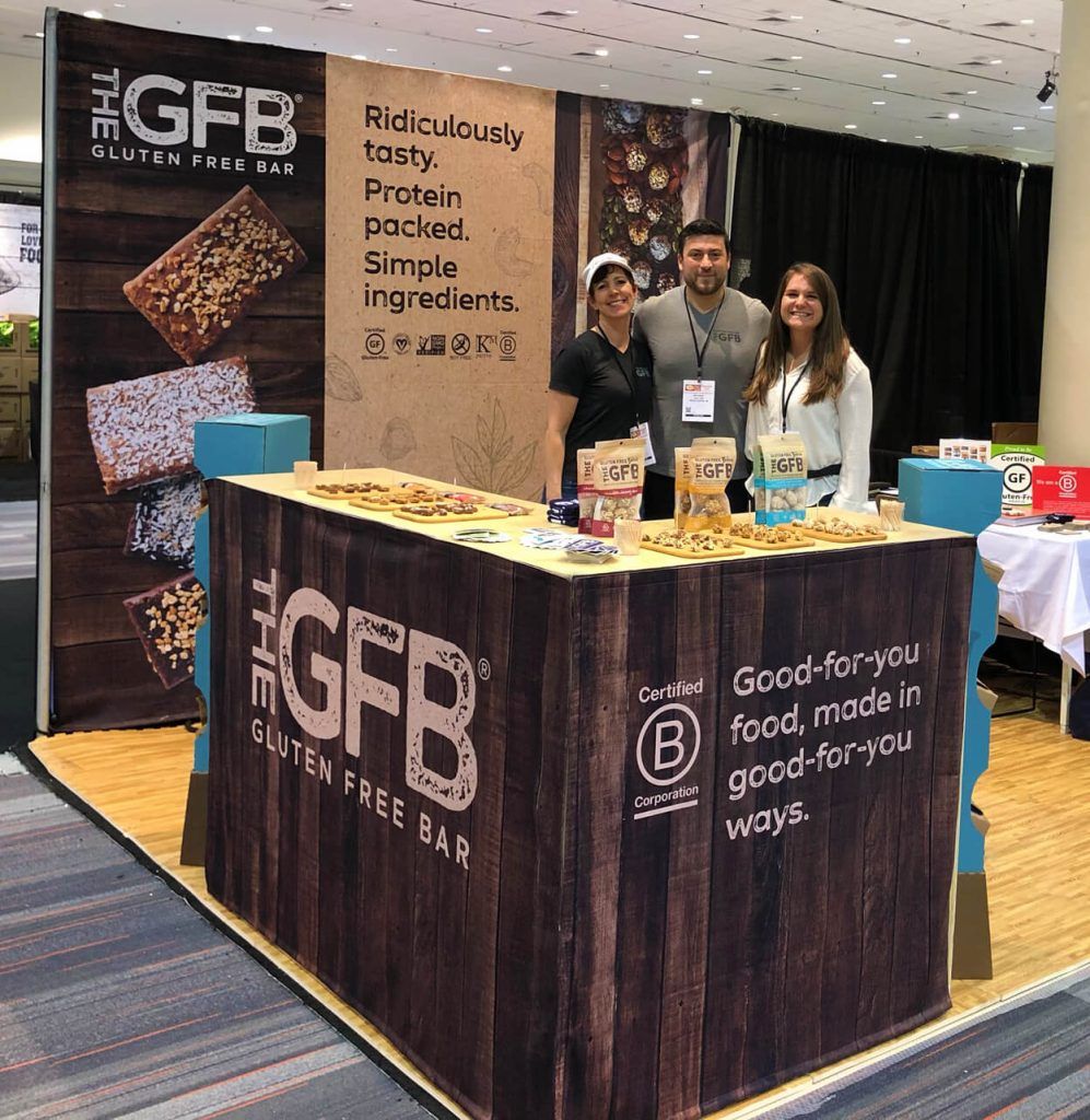 Las Vegas convention booth with custom printed banners and graphics