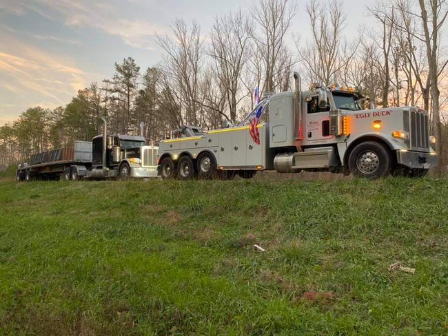 Tow Truck Towing a Broken Down Car — Clanton, AL — Mims Wrecker Service