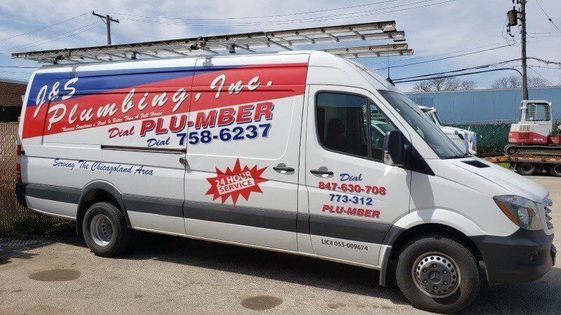 White plumbing van with A&S Plumbing logo, ladder on roof, and phone numbers.
